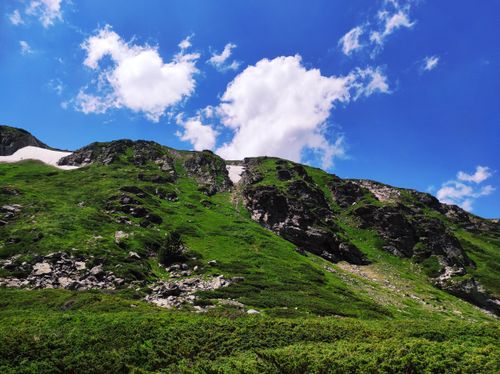 Free Vibrant summer landscape of the lush green mountains in Kyustendil, Bulgaria under a clear blue sky. Stock Photo