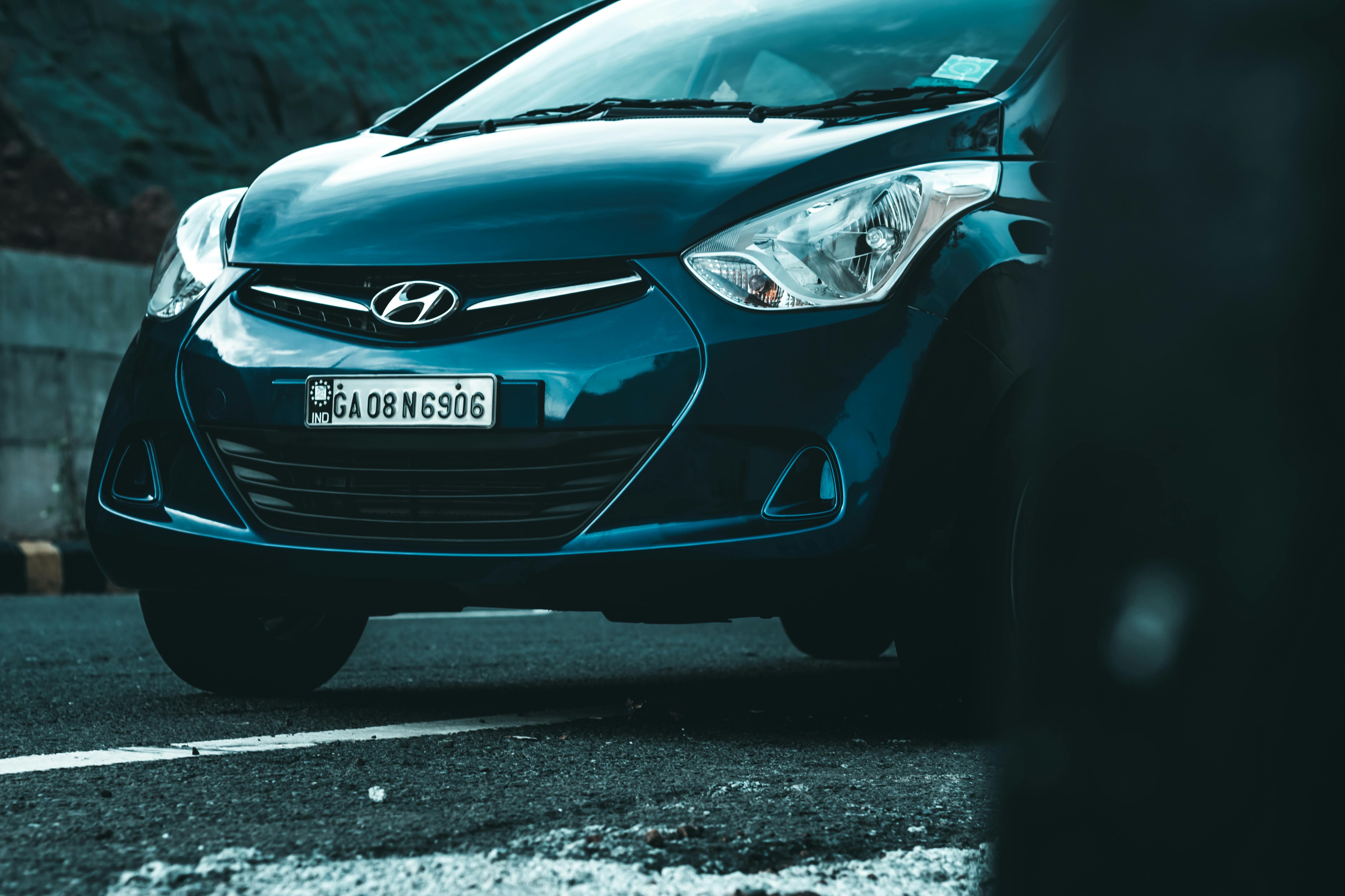 A White Hyundai Car on the Road · Free Stock Photo A White Hyundai Car on the Road · Free Stock Photo
