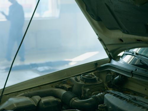 Vehicle on a lift in the service bay