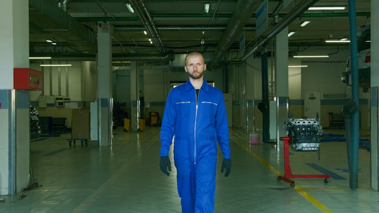 A Bearded Man Wearing Blue Jumpsuit