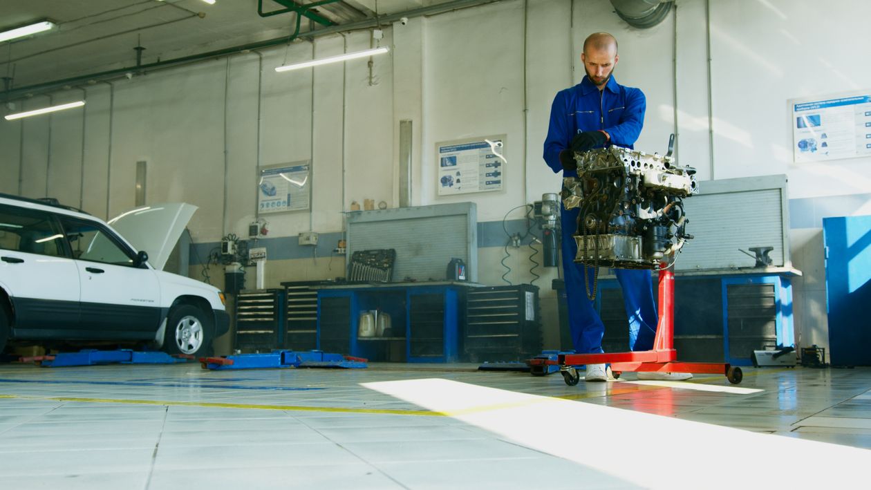 Professional mechanic working in an automotive repair garage