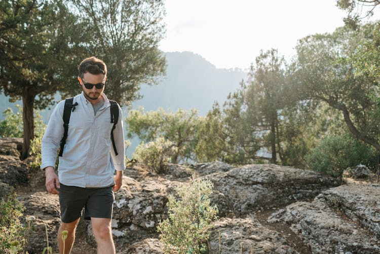 Man On A Trip In A Rocky Valley 