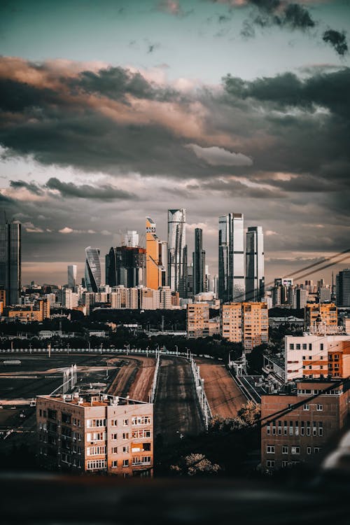 A Cityscape under a Cloudy Sky