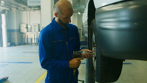 Mechanic Removing a Tire