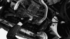 Man Checking Car Undercarriage