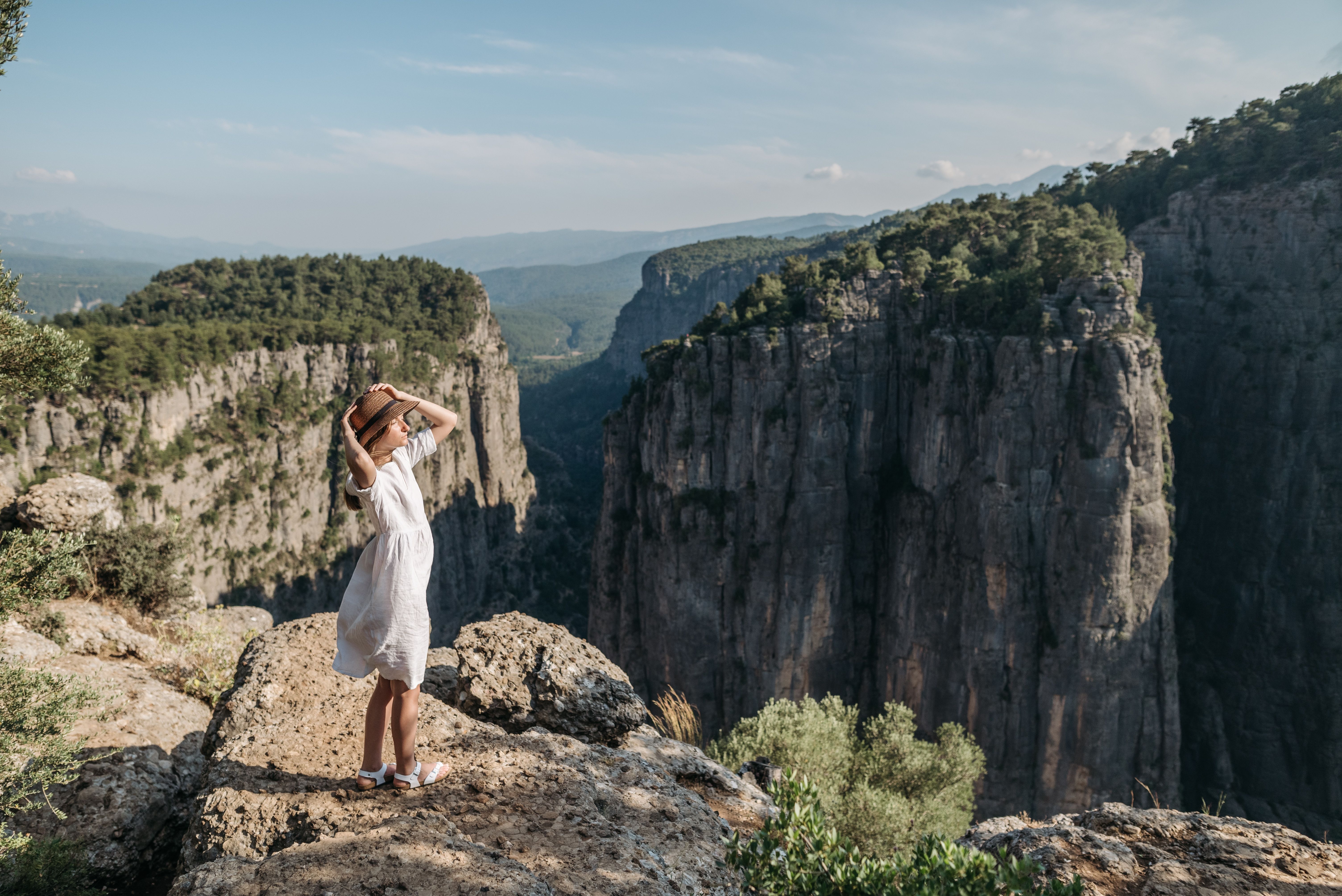 Woman in White Dress Standing on Mountain Top · Free Stock Photo
