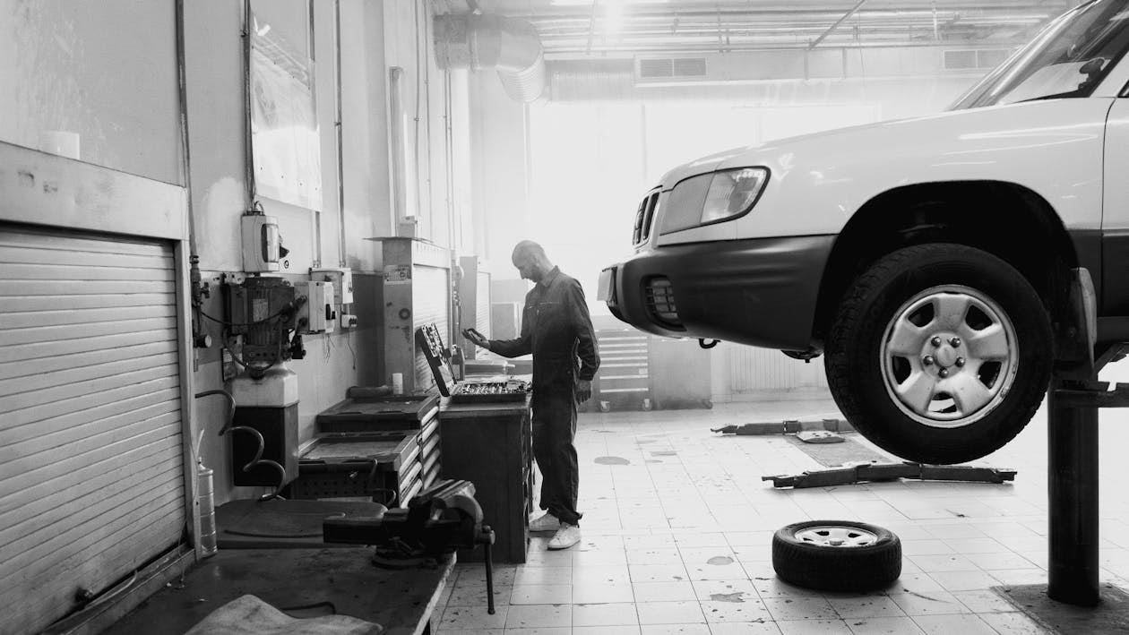 Man Standing Near the Car 