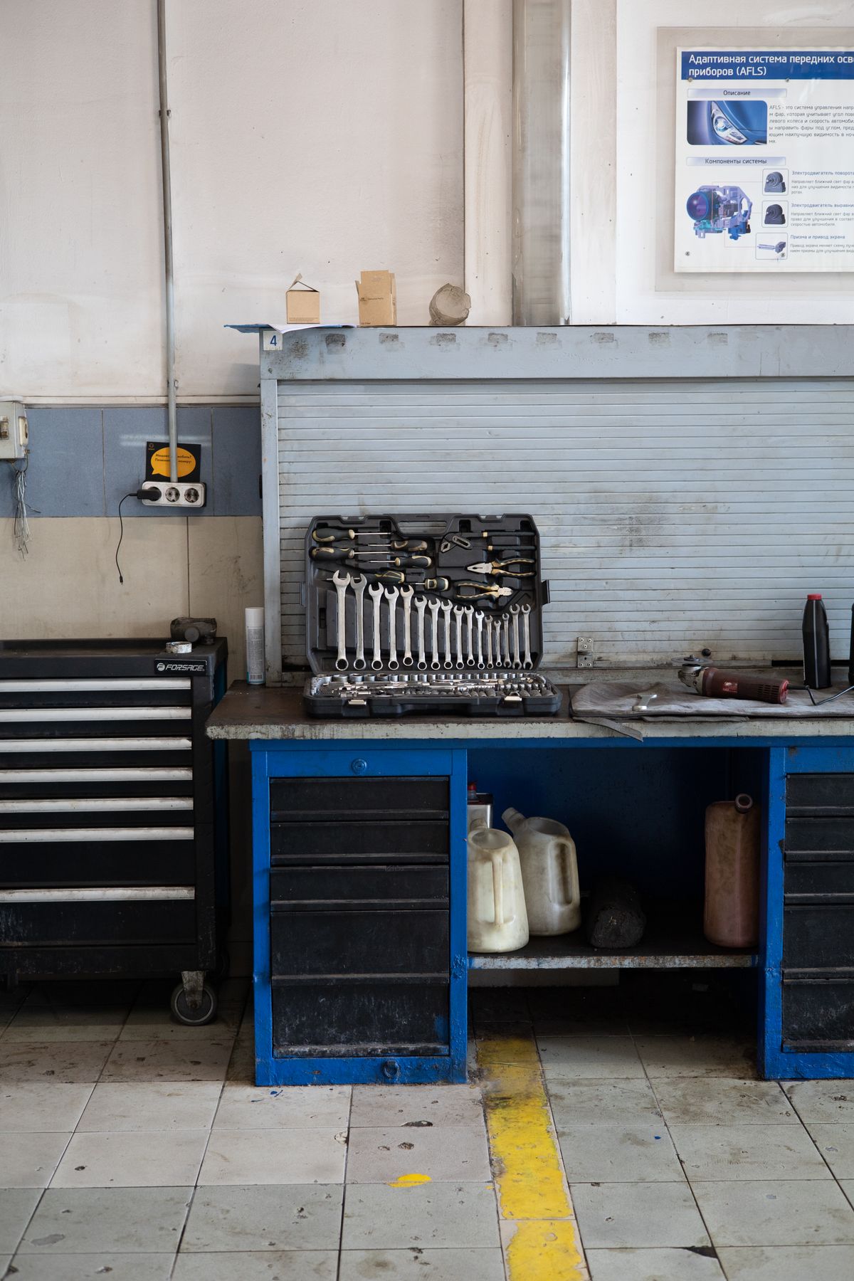 Well-organized garage workbench with tools and equipment ready for air tool projects