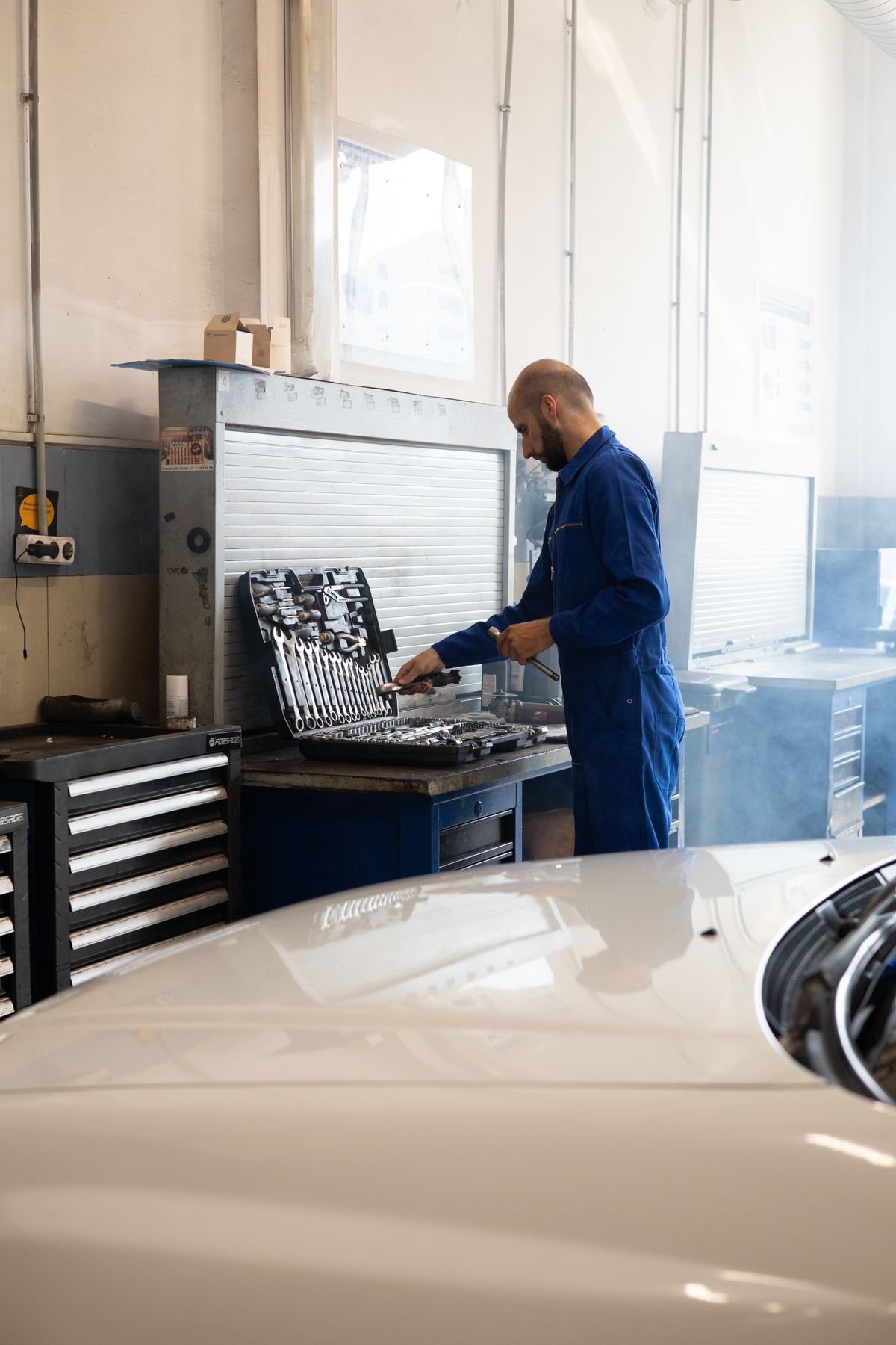 Technician selecting tools at GridIron Auto