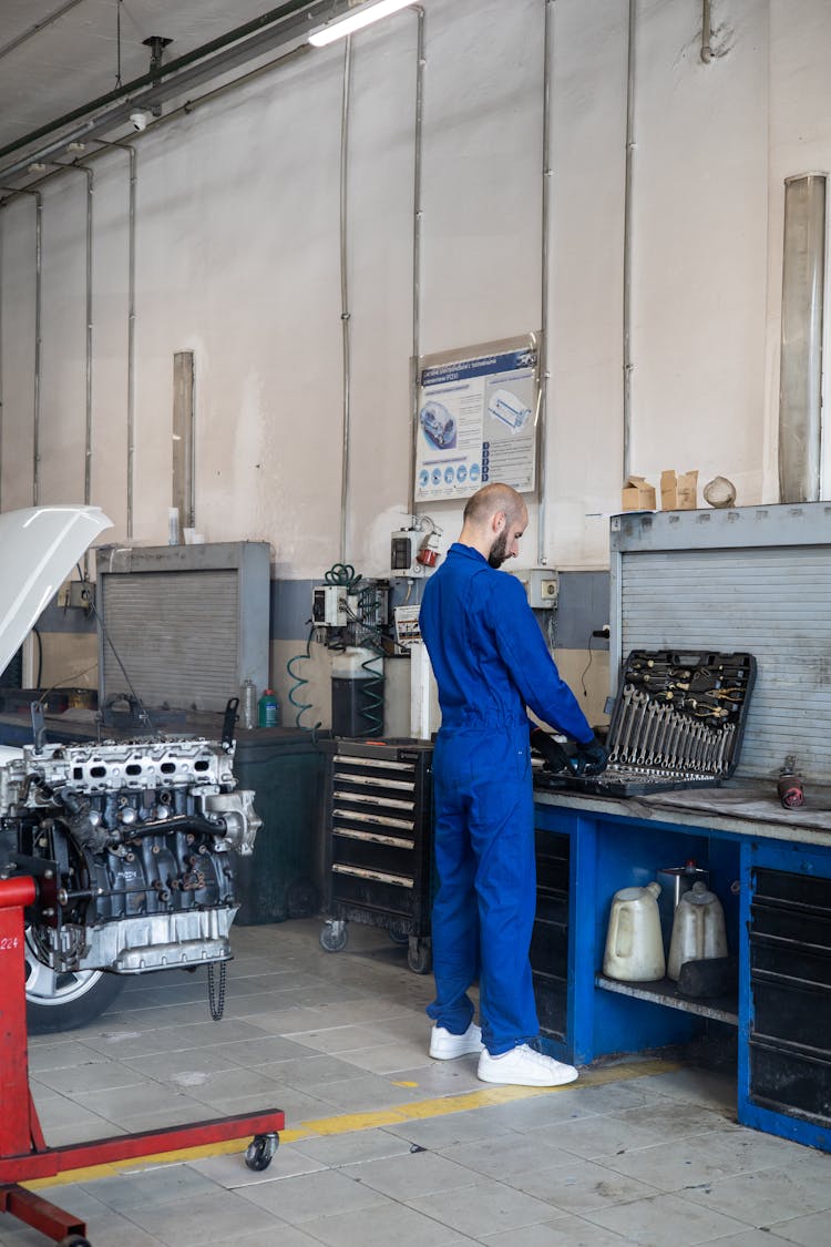 A Man In Blue Jumpsuit