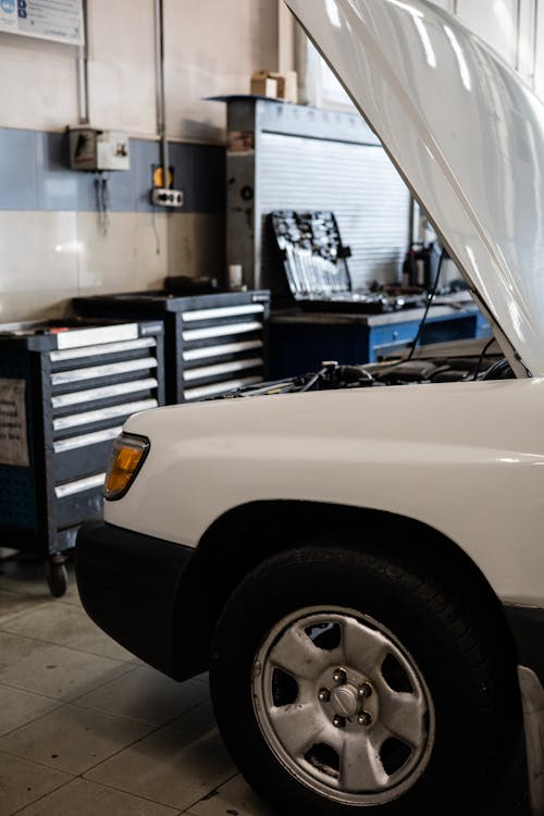 White Car in an Auto Repair Shop