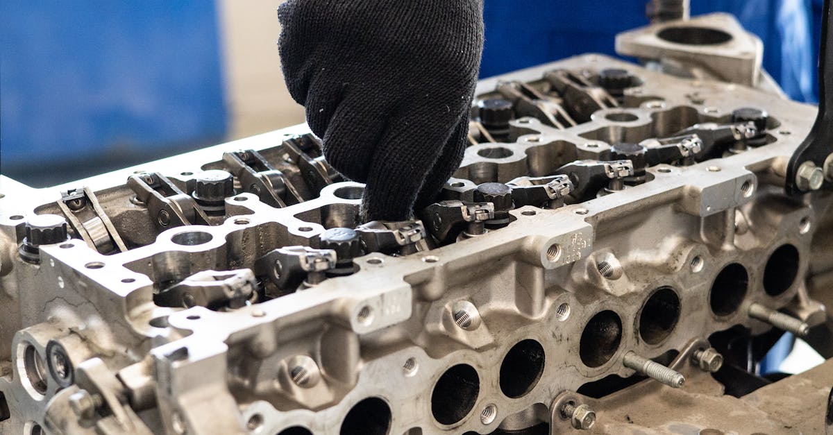 Man Repairing an Engine · Free Stock Photo