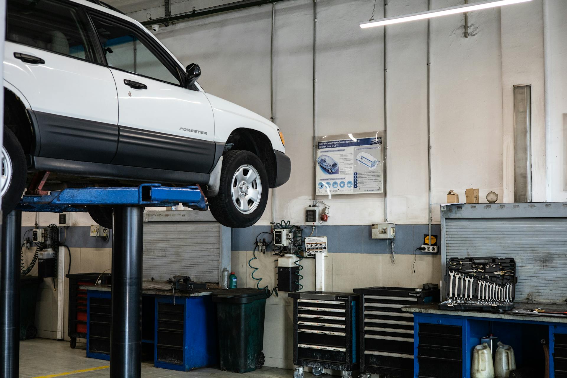 White Car For Maintenance Check Up