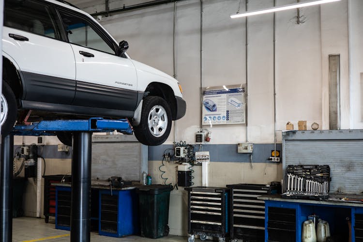 White Car For Maintenance Check Up