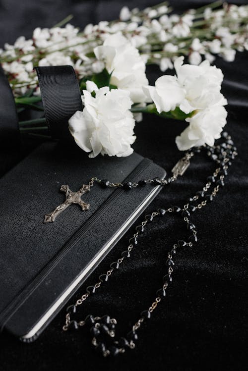White Flowers and a Rosary 