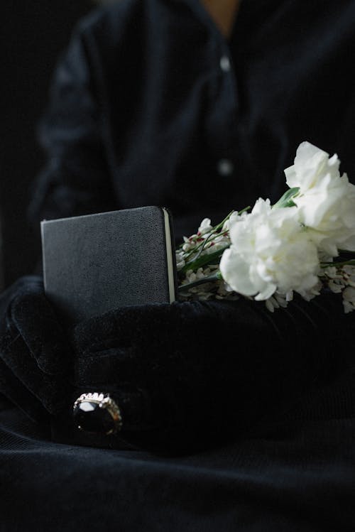 Book and White Flowers on a Wedding Ceremony