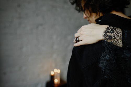 Free Person Giving Comfort To A Mourning Woman Stock Photo