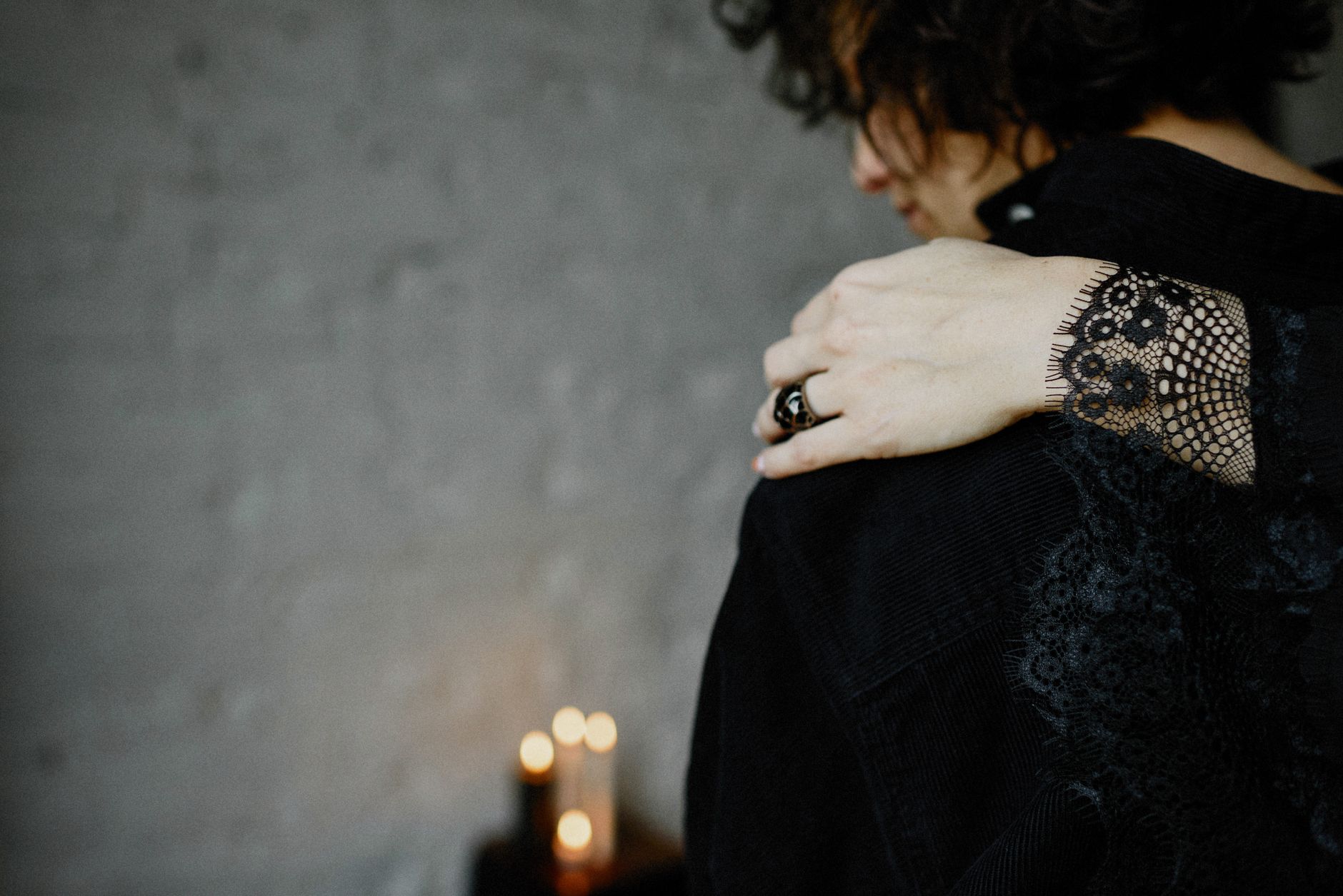 A comforting embrace during a moment of grief, symbolizing support and mourning.