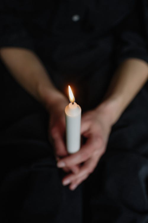 Free Person Holding Lighted Candle  Stock Photo