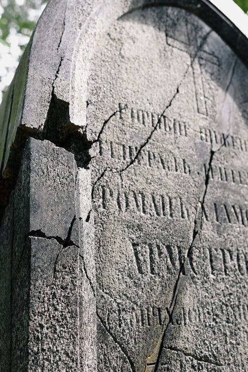 A Concrete Cast Tombstone with Cracks