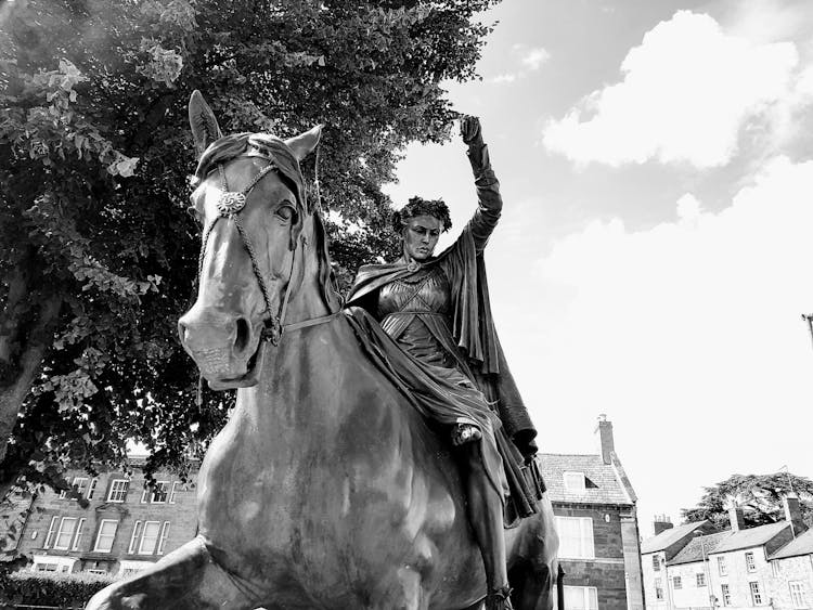 Woman Riding Horse Statue