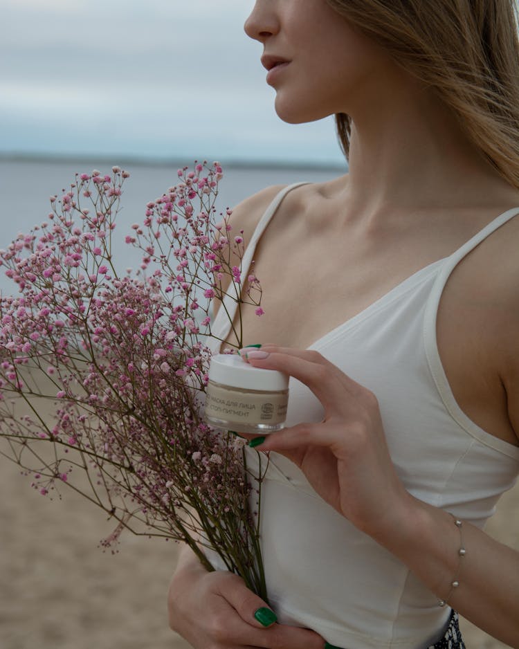 A Person Holding Flowers