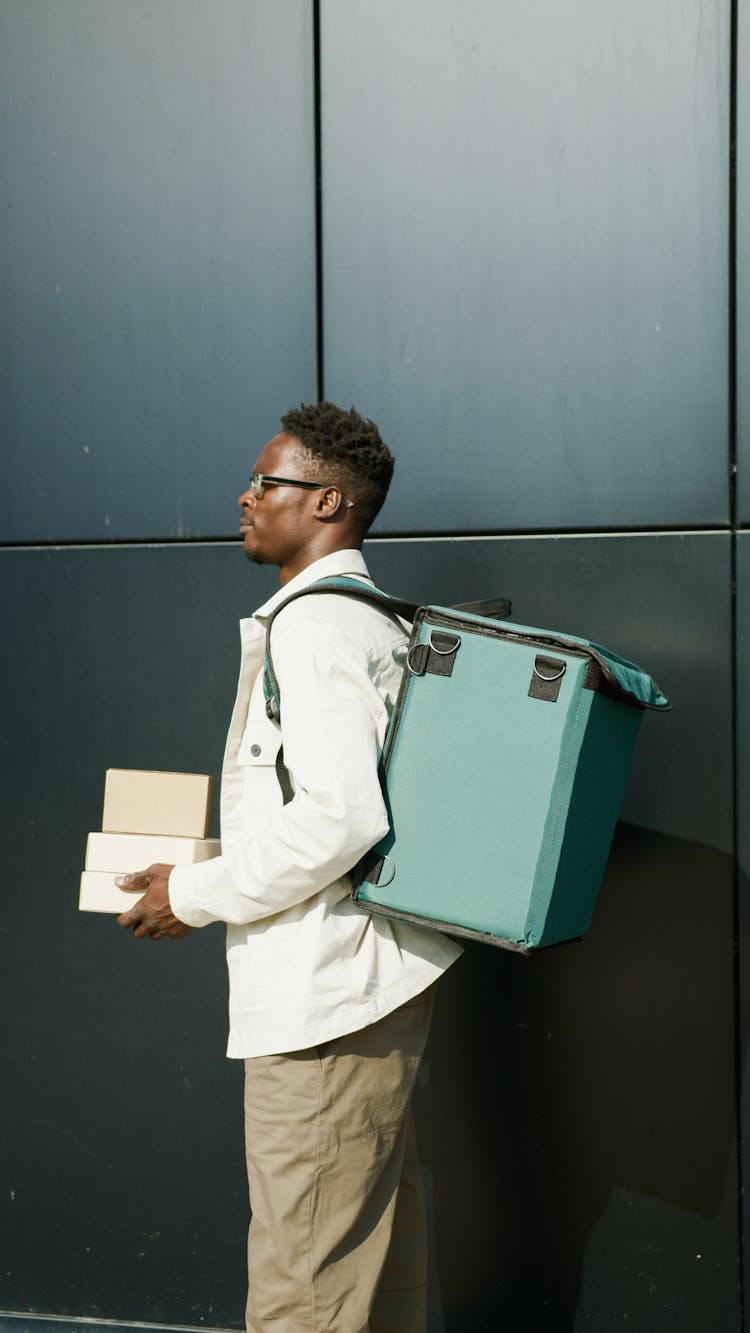 Delivery Man Carrying A  Food Delivery Bag