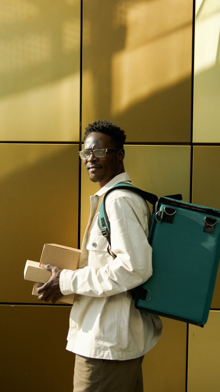 A Man Carrying Packages 