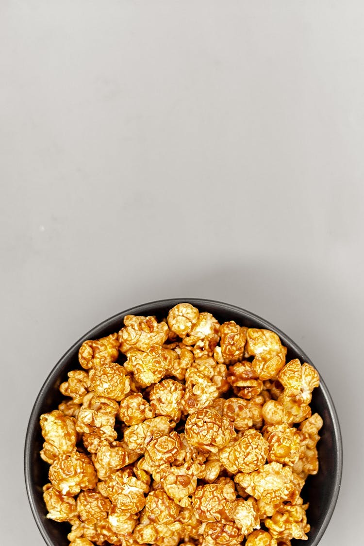 Black Ceramic Bowl With Caramel Popcorn