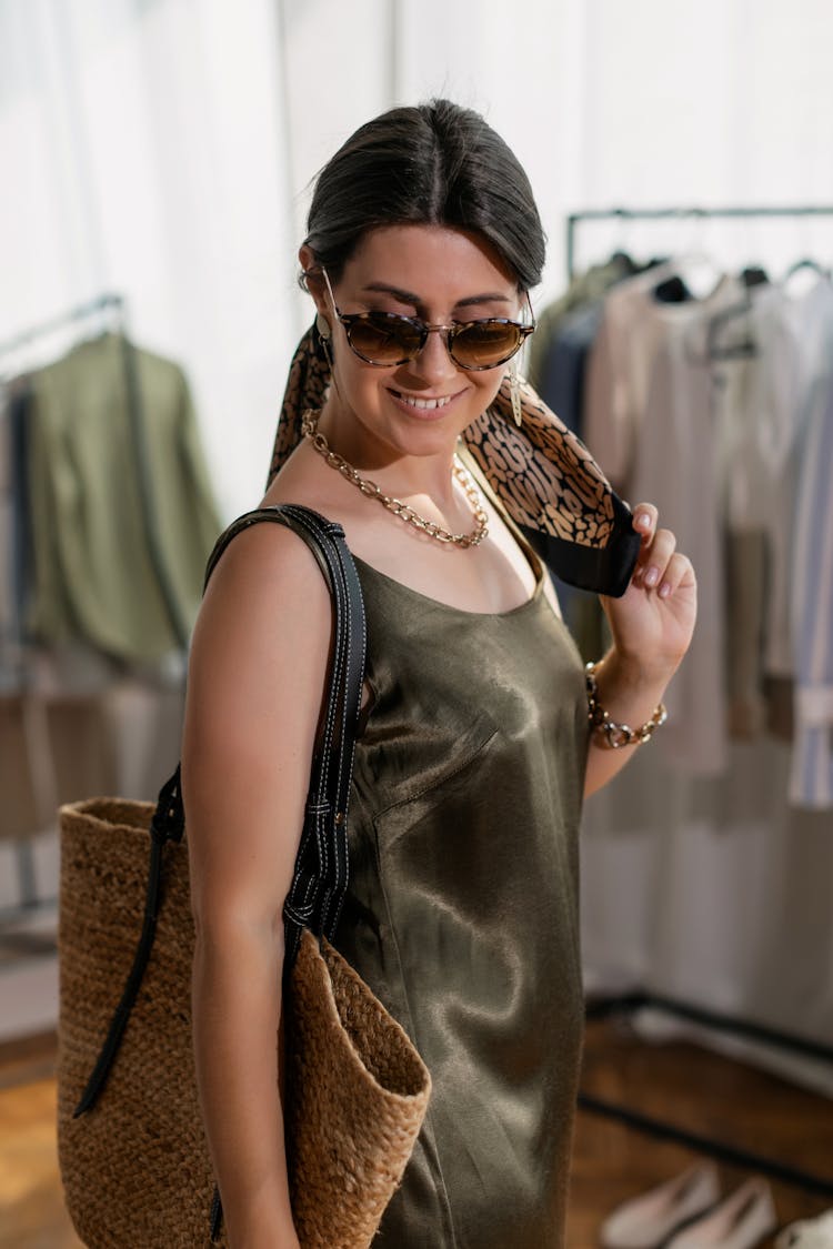 A Woman Carrying A Rattan Bag