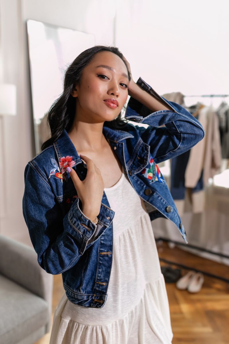 Denim jacket with embroidered flowers on the chest
