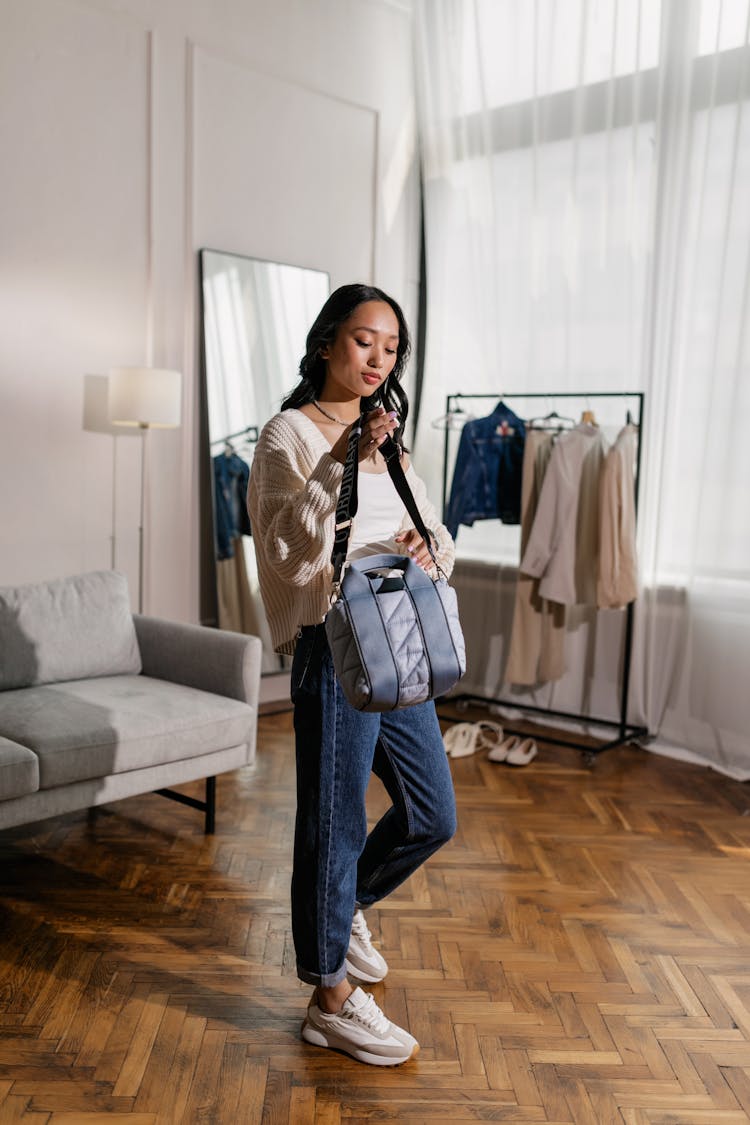 Full Shot Of A Woman Holding A Handbag