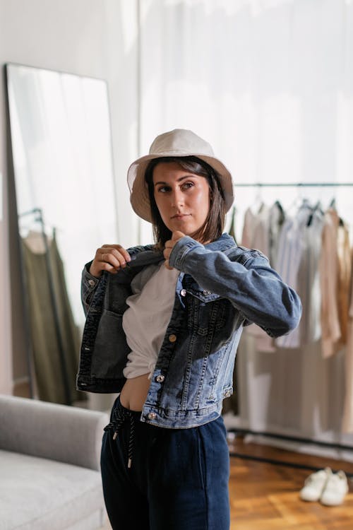 Woman Holding Her Denim Jacket