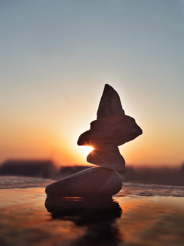 Rocks Balancing In The Beach