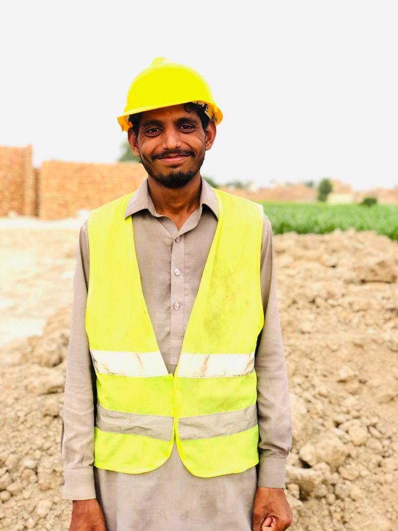 Site worker in safety vest in Punjab