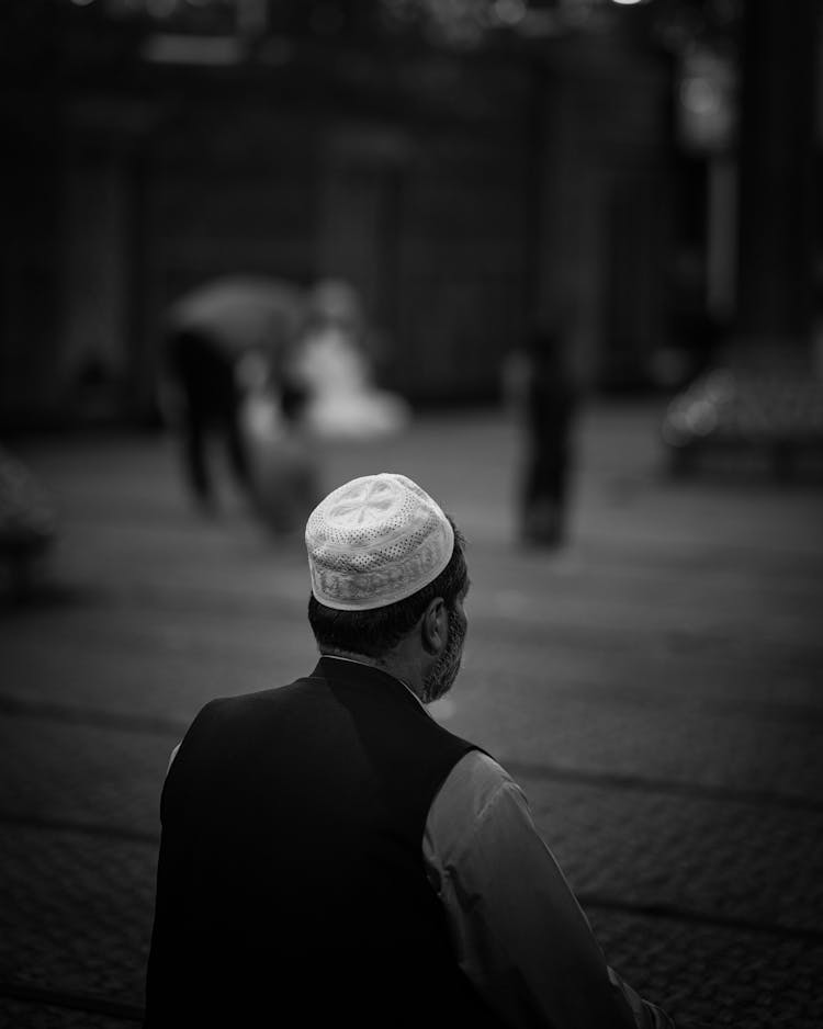 Grayscale Photo Of A Man Wearing Taqiyah