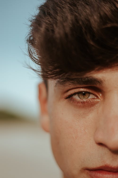 Face of a Man in Close Up Photography