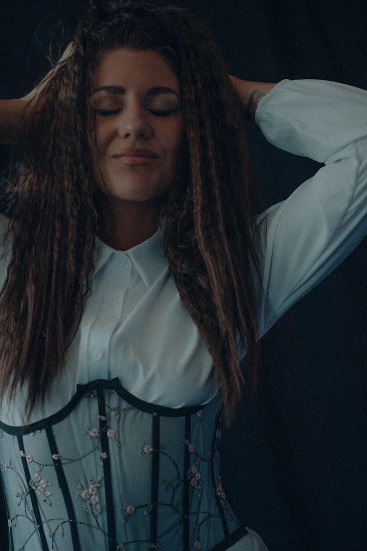 Woman In White Long Sleeve Shirt And Lace Corset