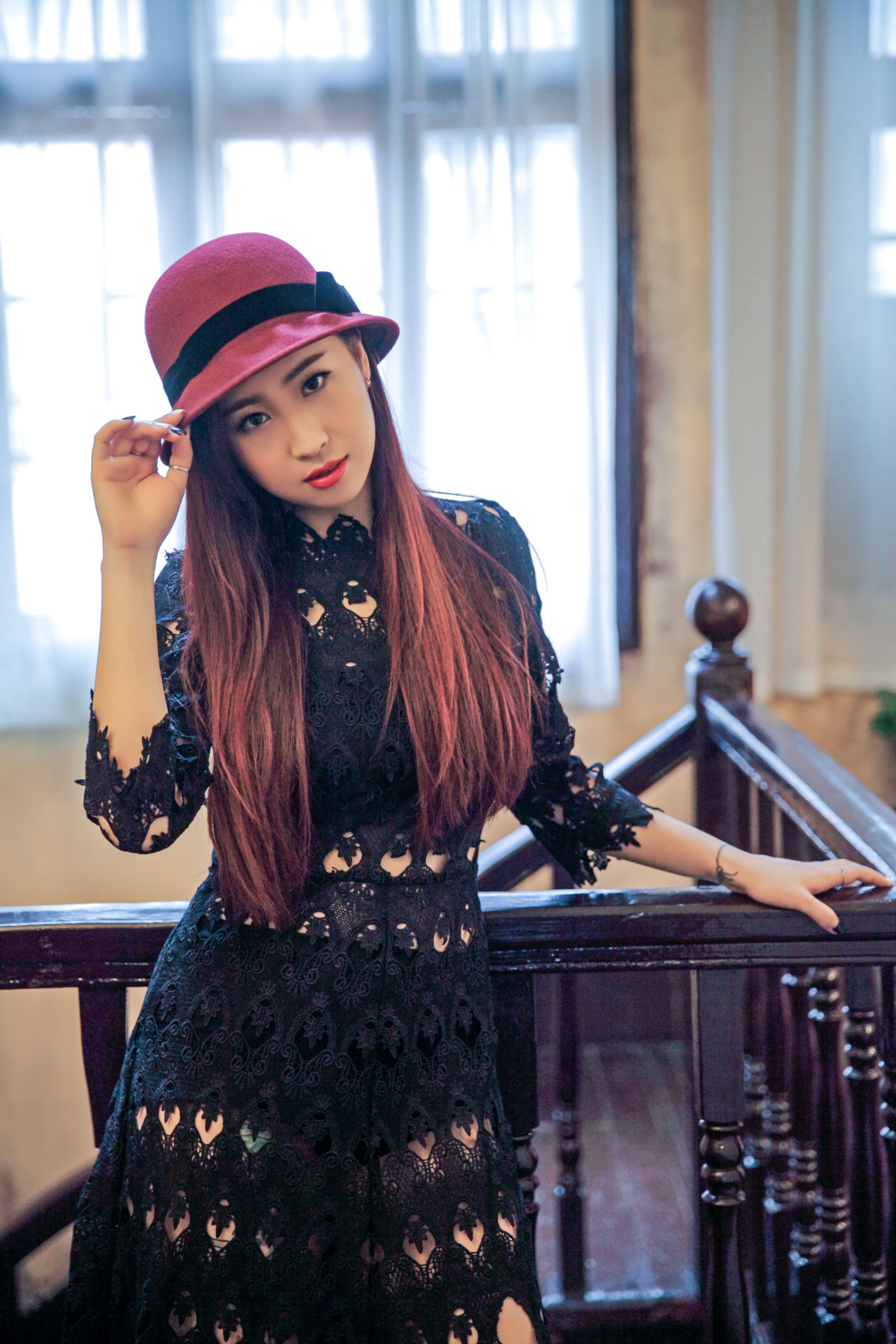 A Woman in a Black Dress Wearing a Hat · Free Stock Photo