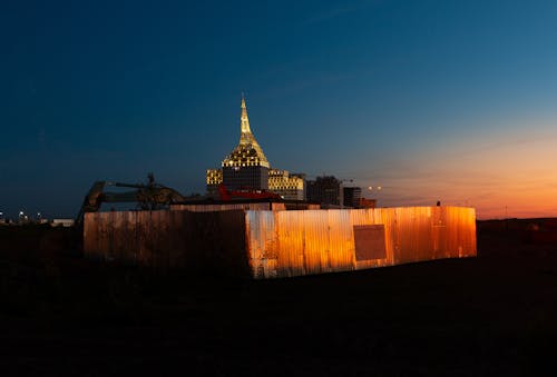 Building Under Construction at Sunset 