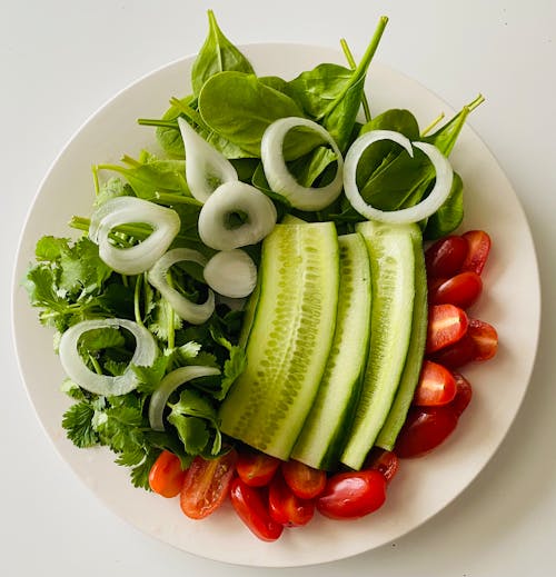 Free A Vegetable Salad on a Ceramic Plate Stock Photo