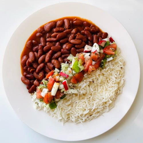 Cooked Rice With Vegetables on White Ceramic Plate