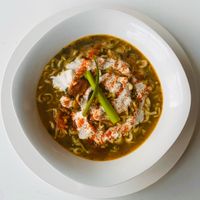 Herb broth soup in a white bowl, photo by Rachel Claire on Pexels