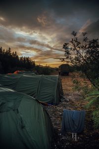 Tents pitched under a dusk sky, photo by Evgenia Egorova on Pexels