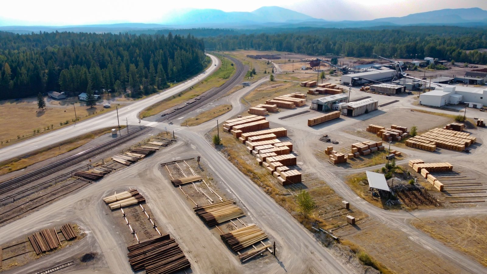 Aerial view of a lumber yard and sawmill in Jaffray, British Columbia