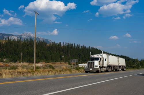 Fotos de stock gratuitas de camión, carga, carretera