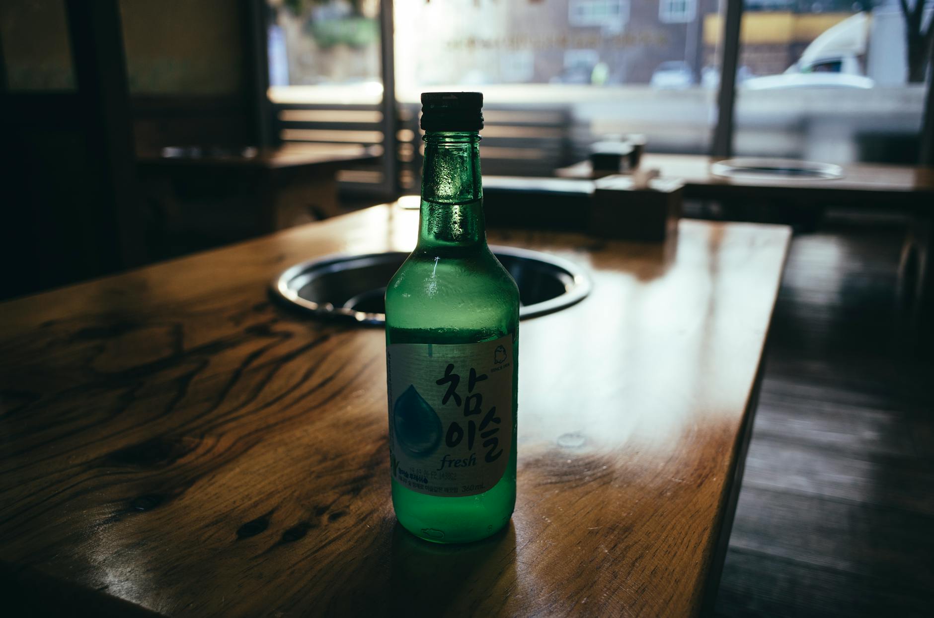 A Close-Up Shot of a Bottle of Soju