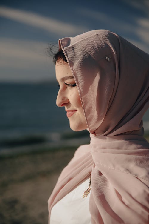 A Woman Wearing a Hijab and a White Top