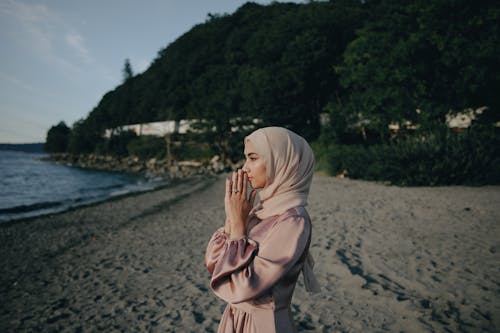 A Woman Standing on the Seashore