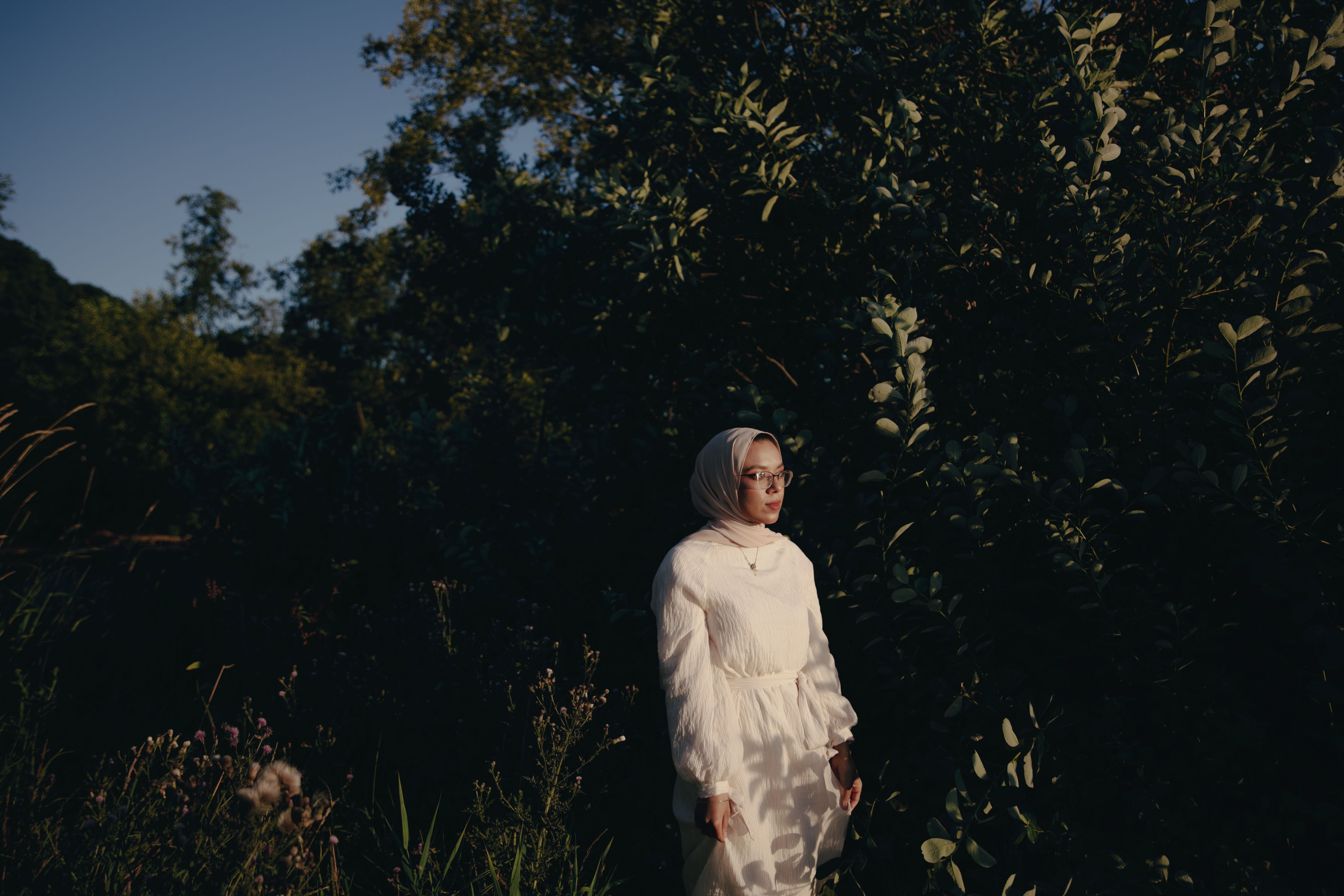 Woman in White Dress Standing Beside a Tree · Free Stock Photo